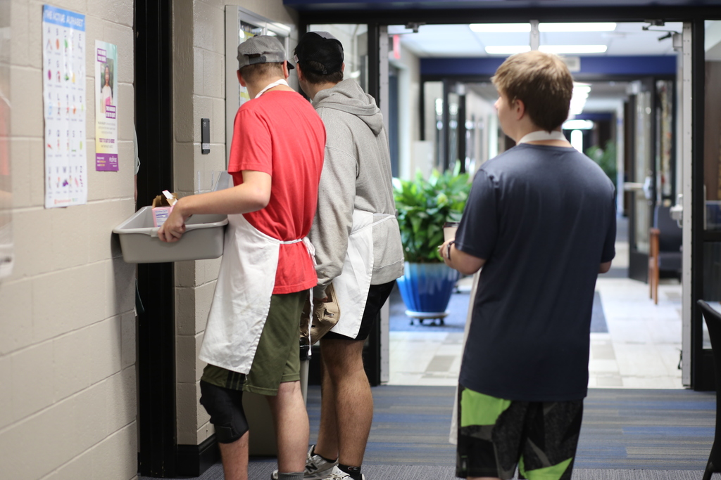 Students waiting outside the office