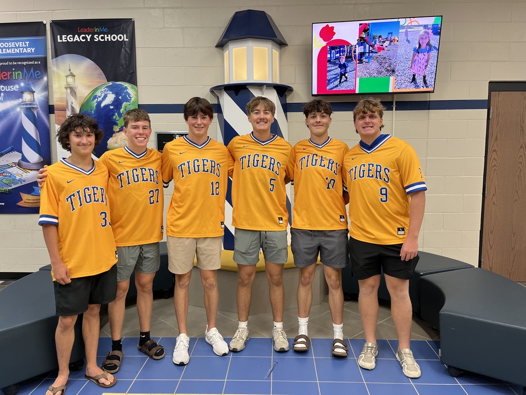 Group of baseball boys posing for picture