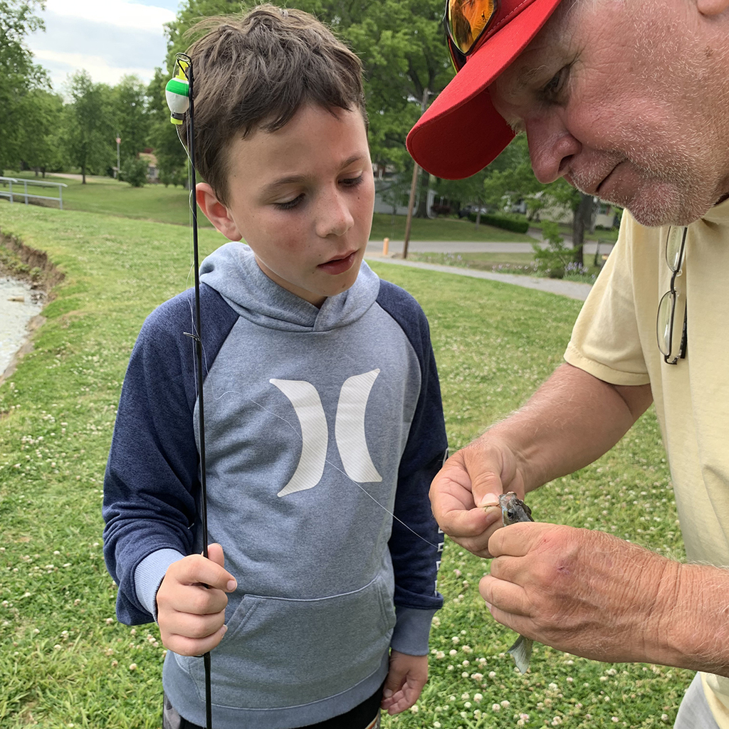 boy learns from mentor