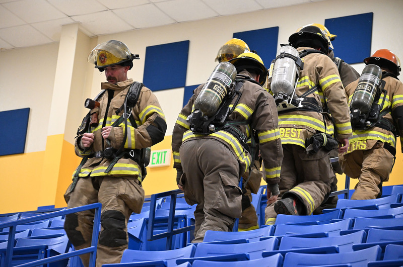 firefighters climbing