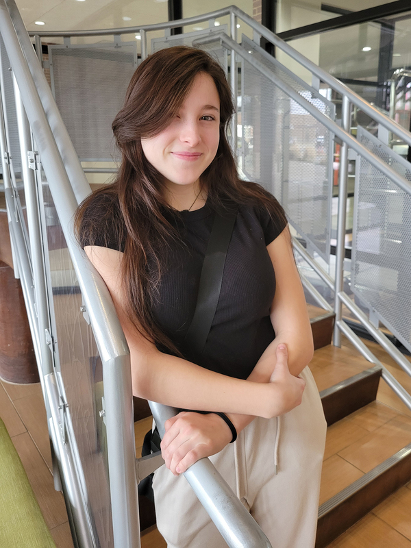 nolah leaning on rail