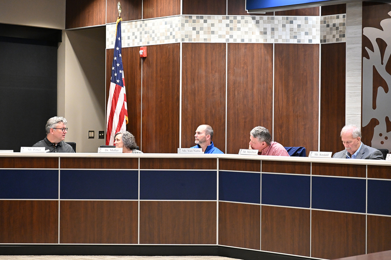Board members sordahl and Anderson listen