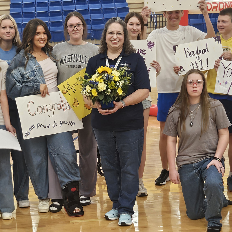 rowland with students