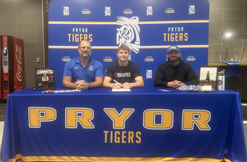 Rhett Taylor with his coaches