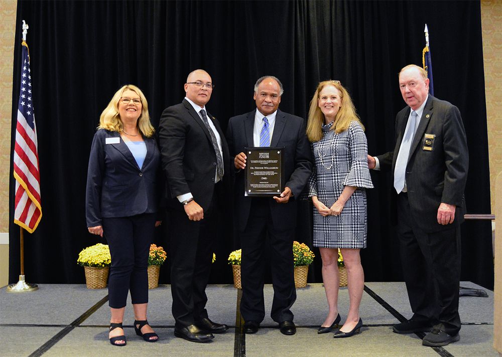 Dr. Freddie Williamson (center), Superintendent of Public Schools of Robeson County wins the Burroughs Wellcome 2025 A. Craig Phillips North Carolina Superintendent of the Year Award. Dr. Williamson stands with (from left to right) Katherine Joyce, Executive Director, NC Association of School Administrators (NCASA); Alfred Mays, Chief Diversity Officer, Senior Program Officer, Director and Chief Strategist for Diversity and Education, Burroughs Wellcome Fund; Leanne Winner, Executive Director, NC School Boards Association; and Jack Hoke, Executive Director, NC School Superintendents’ Association. (Photo courtesy of Rick Scoggins, NCASA)