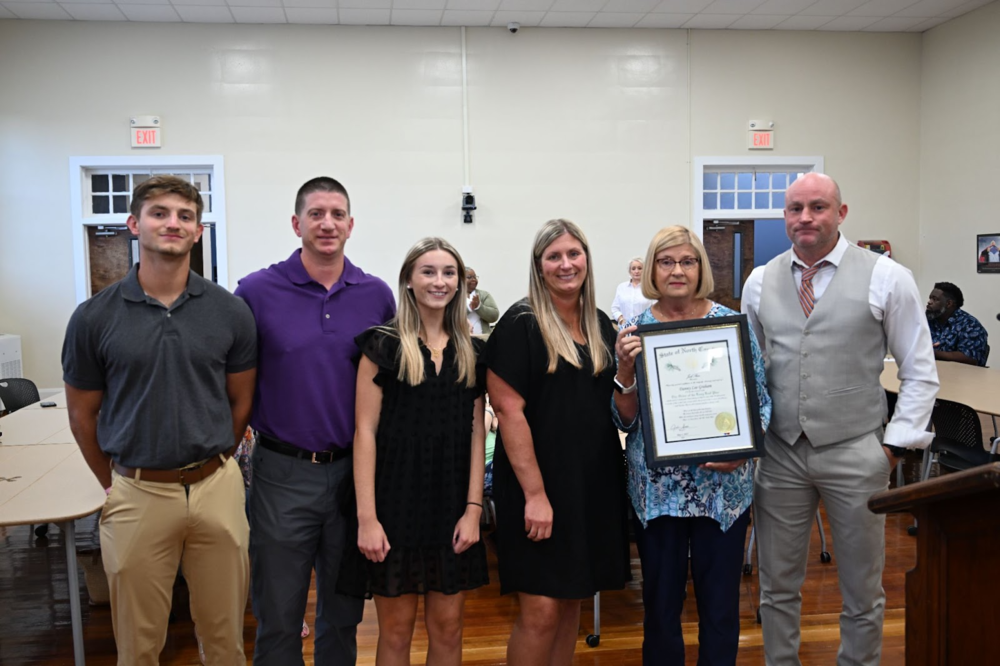 Coach Graham's family receives honor from Sen. Danny Britt