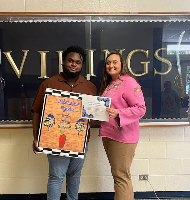 Celebrating our Certified and Classified Employees of the Month at Lumberton Junior High School!  Pictured: Mr. Donique McLaurin receiving the Certified Employee of the Month Award and Mrs. Peyton McMillian Locklear receiving the Classified Employee of the Month Award. Presentation by Ms. Lauren Britt, Academic Coach.  Both Mr. McLaurin and Mrs. Locklear were recognized by their peers for dedication and hard work. Thank you for being such great coworkers who willingly support the Lumberton Junior High School team!  #LumbertonJuniorHigh #EmployeesOfTheMonth #TeamLJHS #CommunityPride