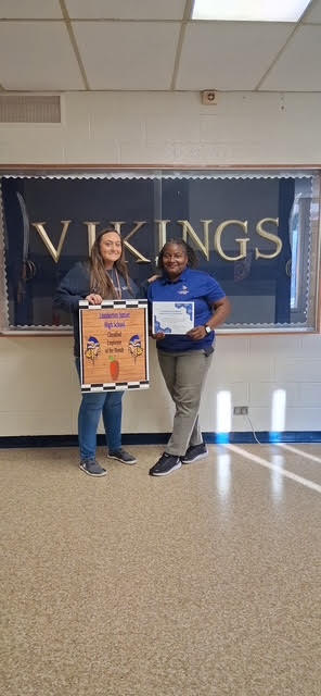 We are proud to recognize our Classified Employee of the Month! Pictured is Ms. Meropi Hawkins, receiving the Classified Employee of the Month Award at Lumberton Junior High School. The award was presented by Ms. Lauren Britt, Academic Coach. Ms. Hawkins was selected by her peers for her dedication, hard work, and willingness to go above and beyond. Thank you for being such an outstanding coworker and for always supporting the Lumberton Junior High School team!