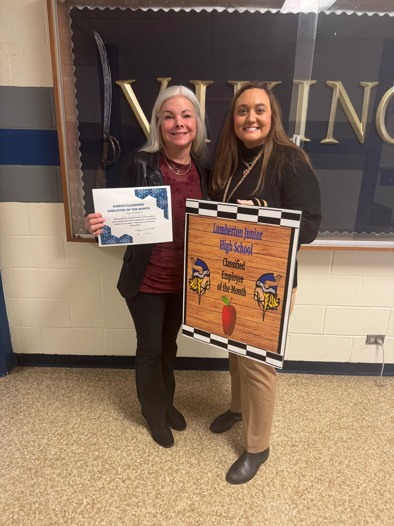 Mrs. Pamela Benton, receiving the Classified Employee of the Month Award