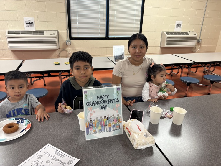 A family sharing breakfast at school
