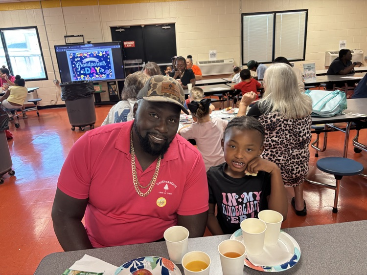 A family sharing breakfast at school