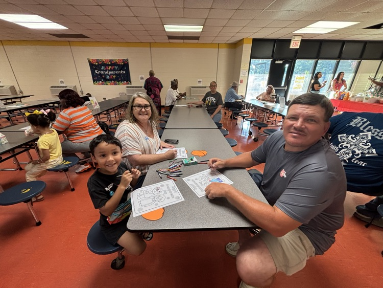 A family sharing breakfast at school