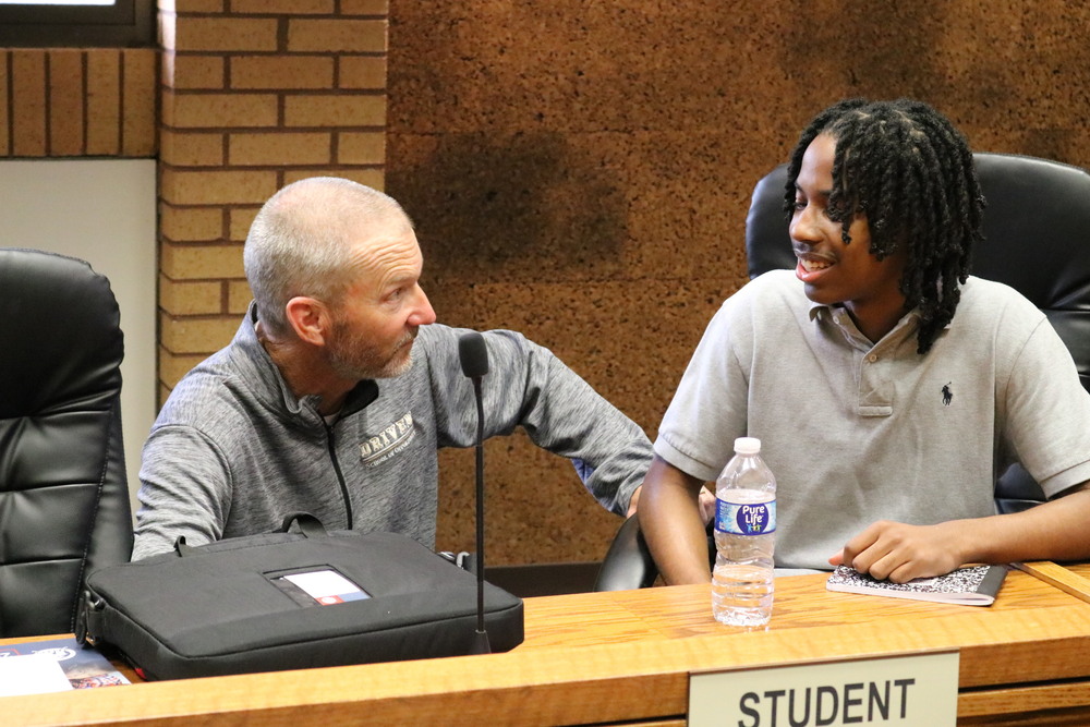 Principal Eskola and Reeder Henry