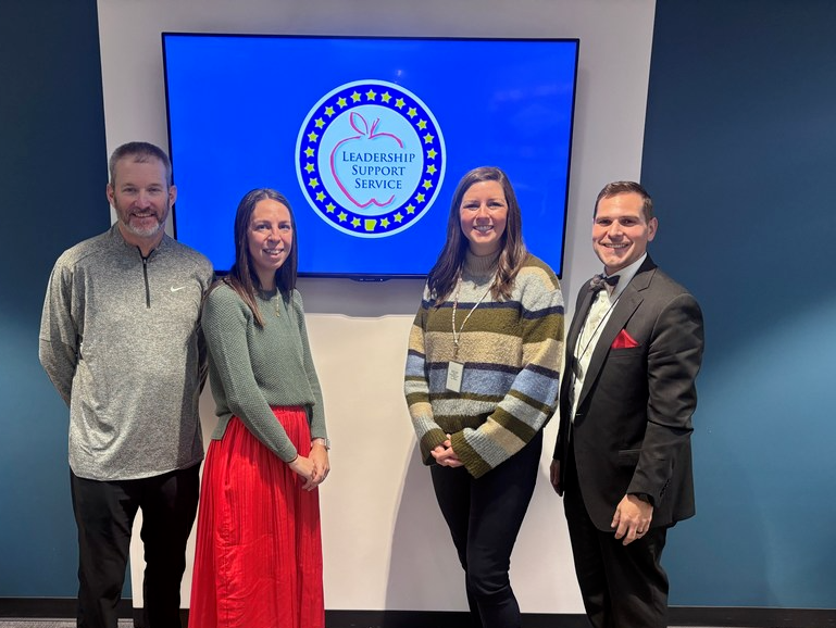 Four PCSSD representatives at the Arkansas School Board. Todd Eskola, Rachel Blackwell, and Dr. Lutrell are among them.