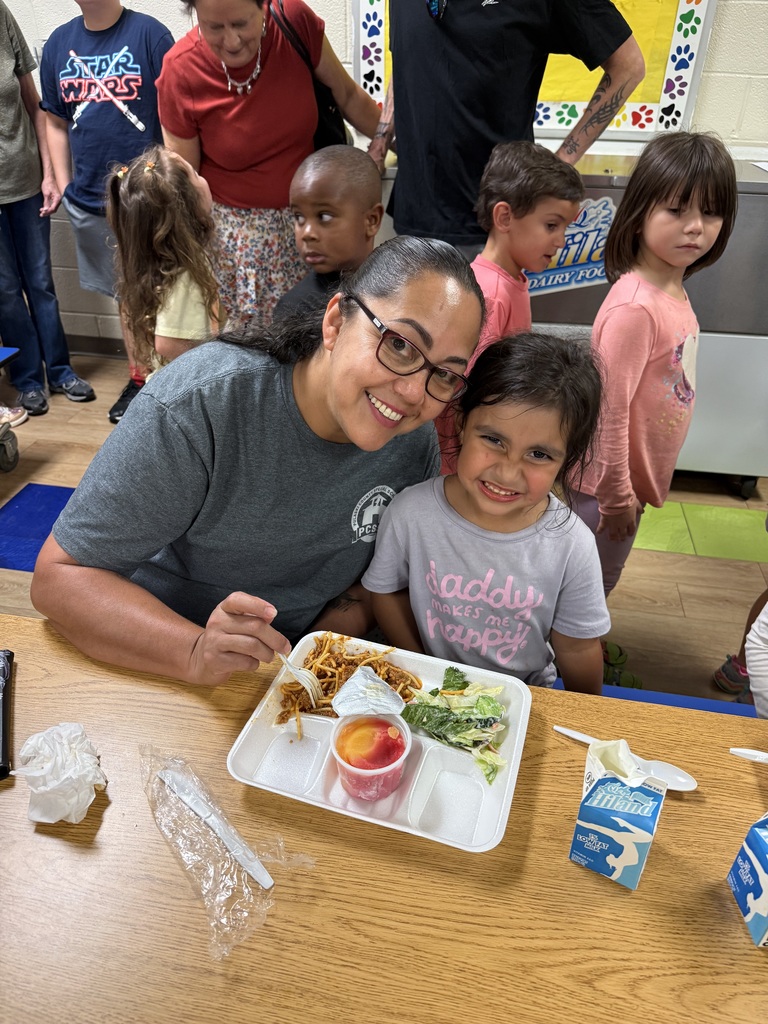 Image of a pre-k student and her grandmother