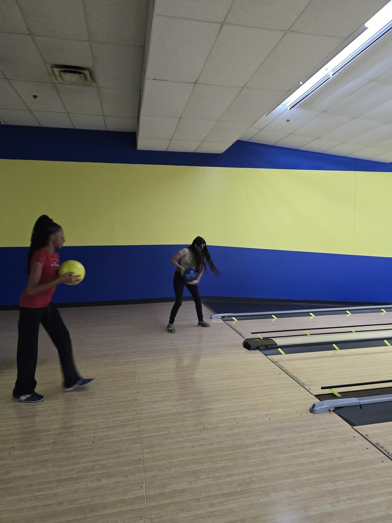 Two students bowling
