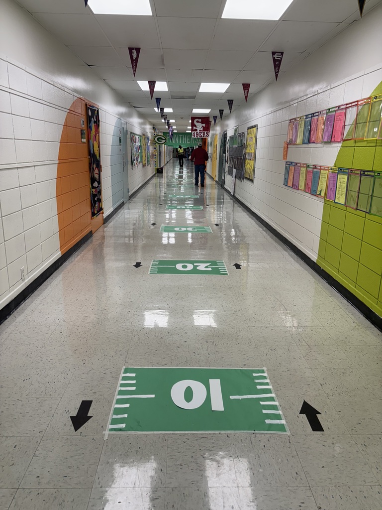 The halls were decorated like a football field!