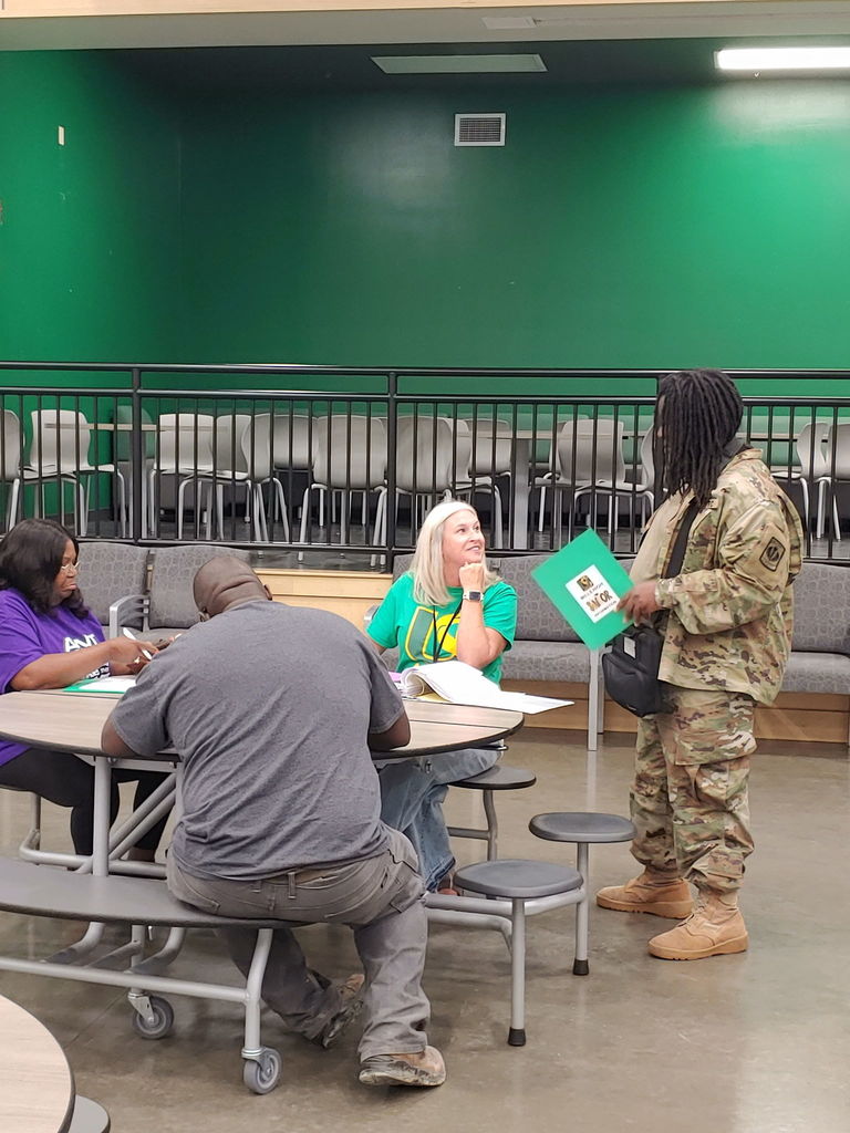 Student speaking to school counselor
