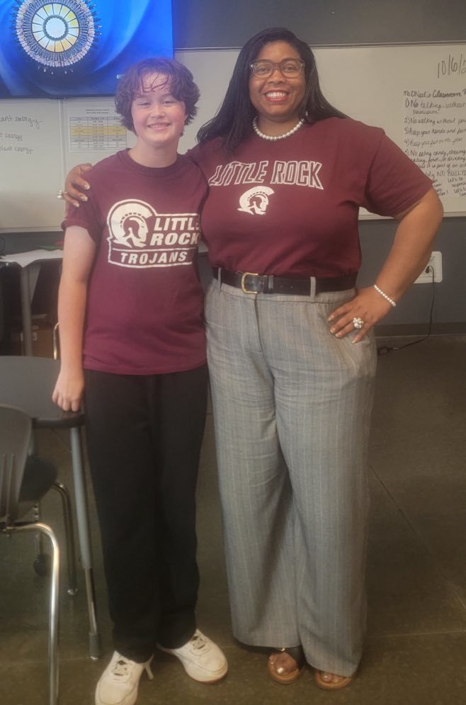 Group of students wearing college shirts for AVID Day Robison Middle School
