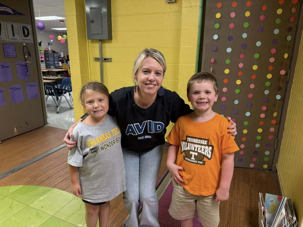 Group of students wearing college shirts for AVID Day Sherwood Elementary School