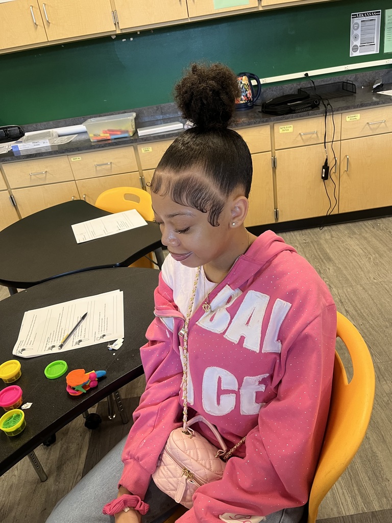Student with her brain model