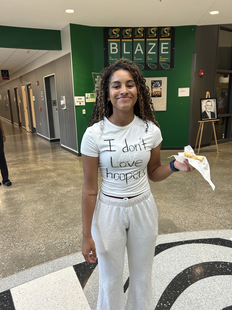 Student with "I don't love hoopers" on her shirt