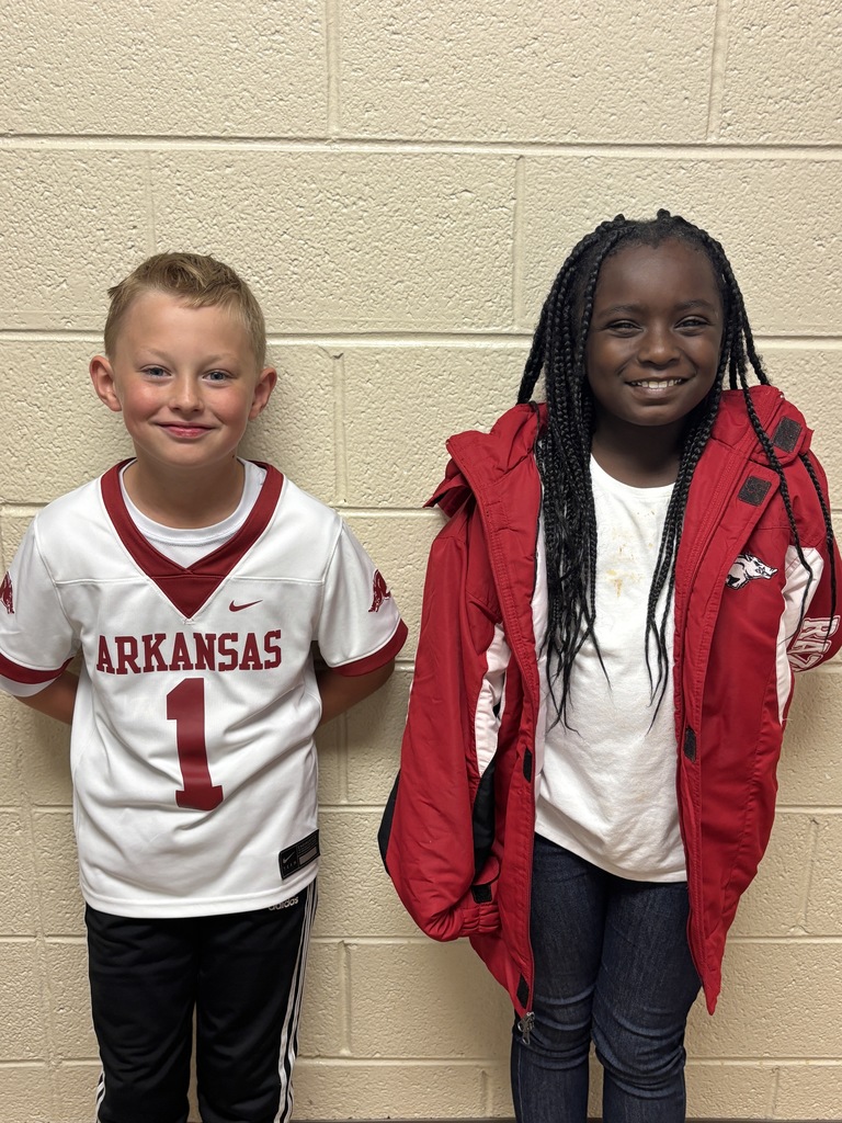 Third Graders in college shirts/jerseys to show that we are educating ourselves on a drug free lifestyle.