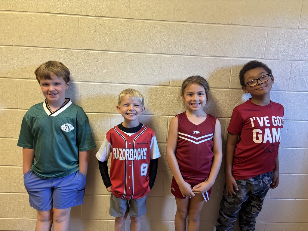 Second Graders in college shirts/jerseys to show that we are educating ourselves on a drug free lifestyle.