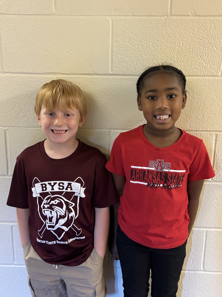 First Graders in college shirts/jerseys to show that we are educating ourselves on a drug free lifestyle.