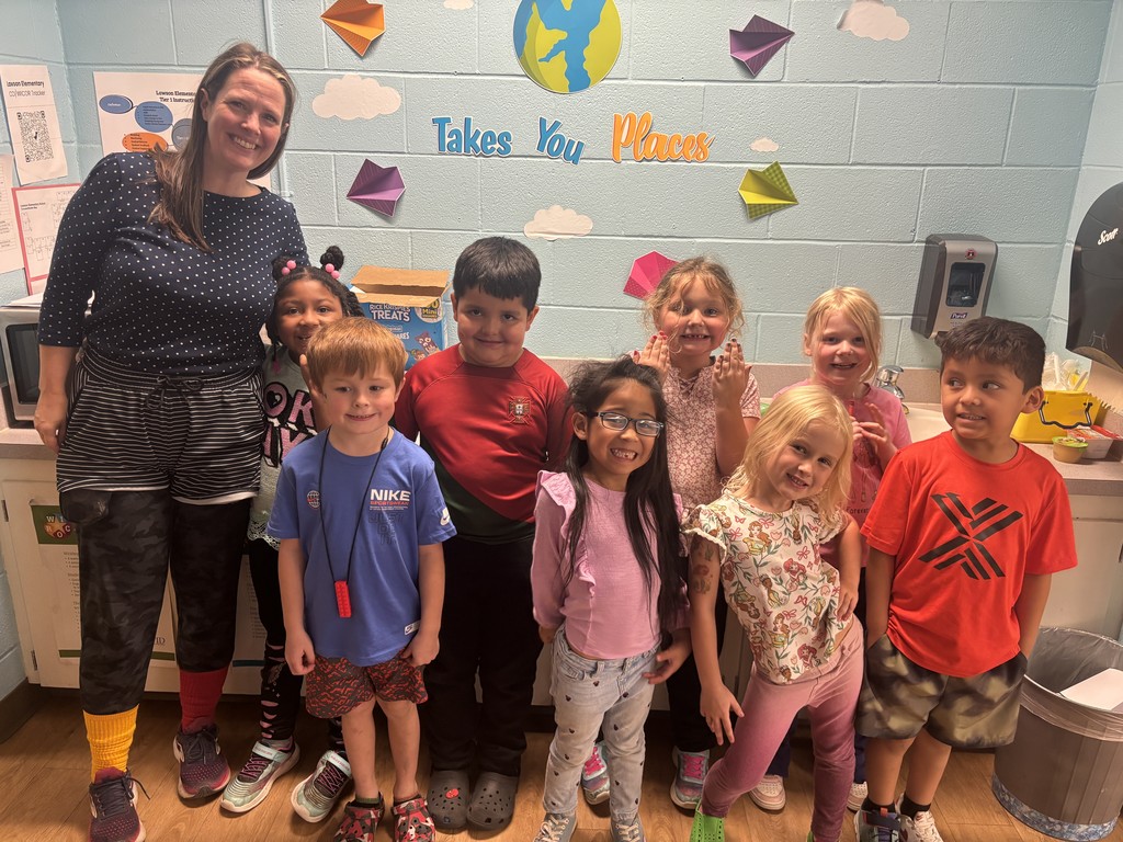 Image of  Kindergarten Students and their teacher in Mix Match clothing