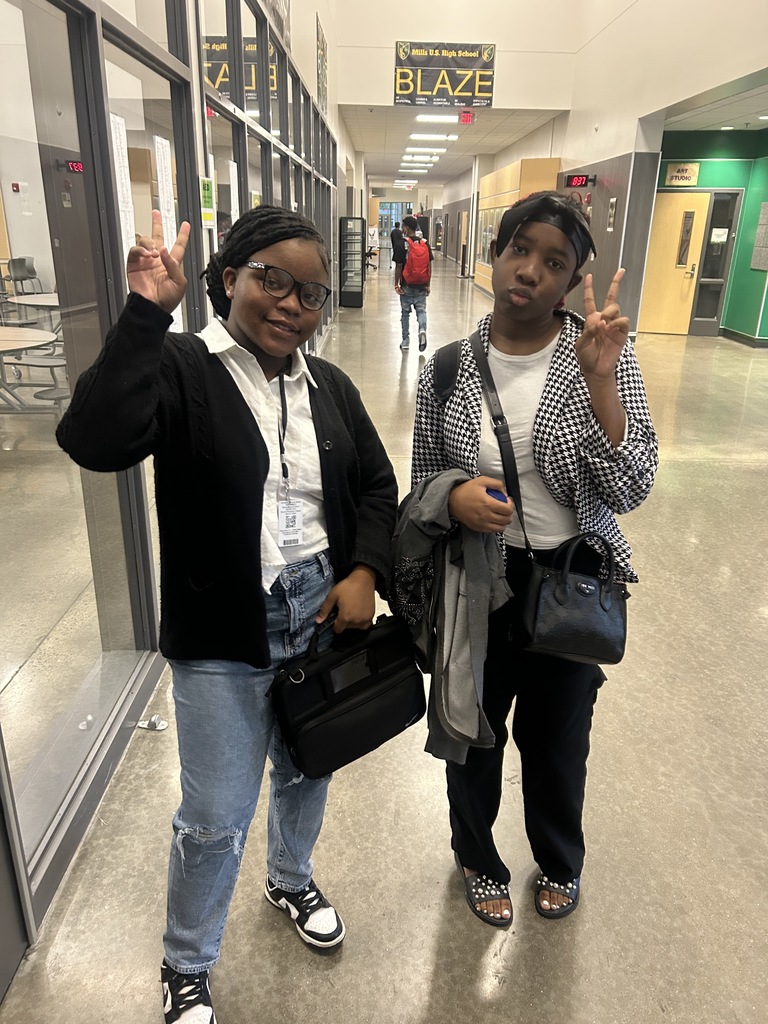 Two students dressed as teachers