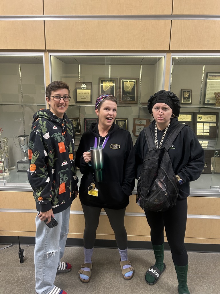 Three teachers dressed as students