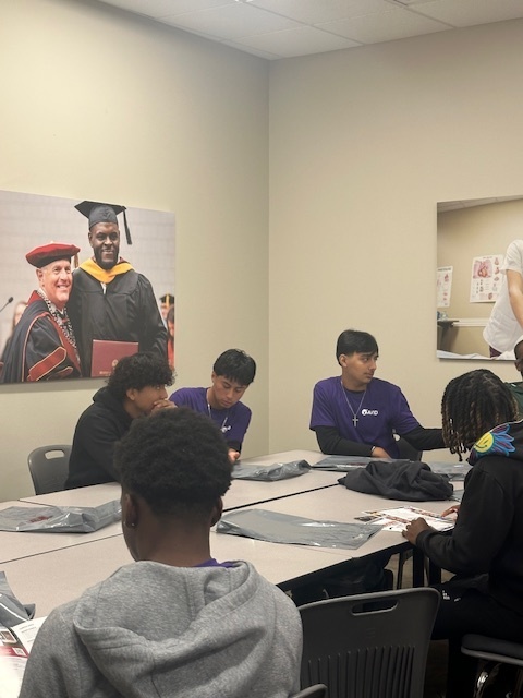 Students at table for college visit