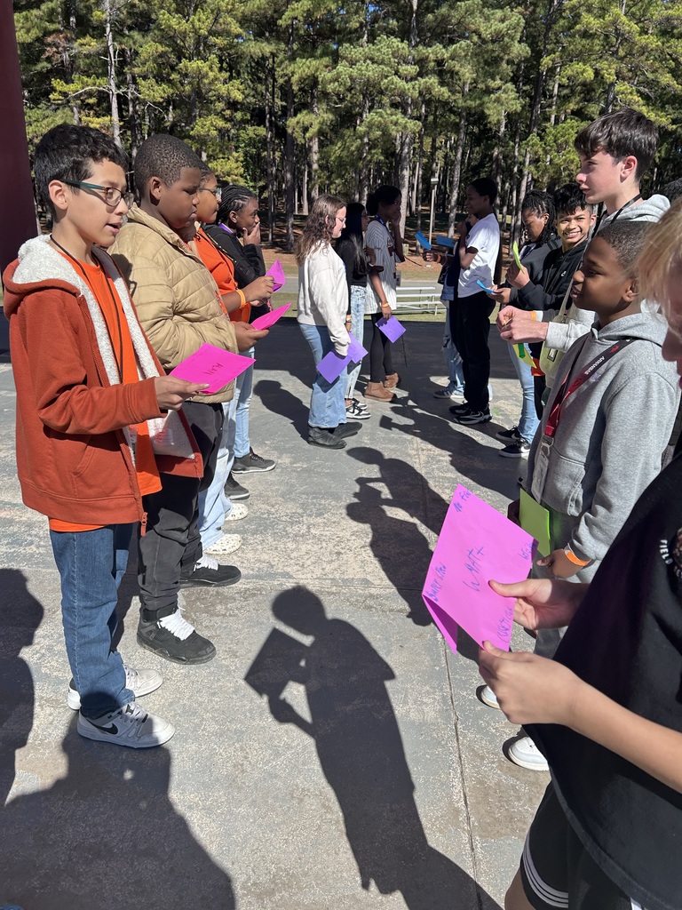 Picture of AVID scholars engaged in lines of communication activity at Lake Willastein Park