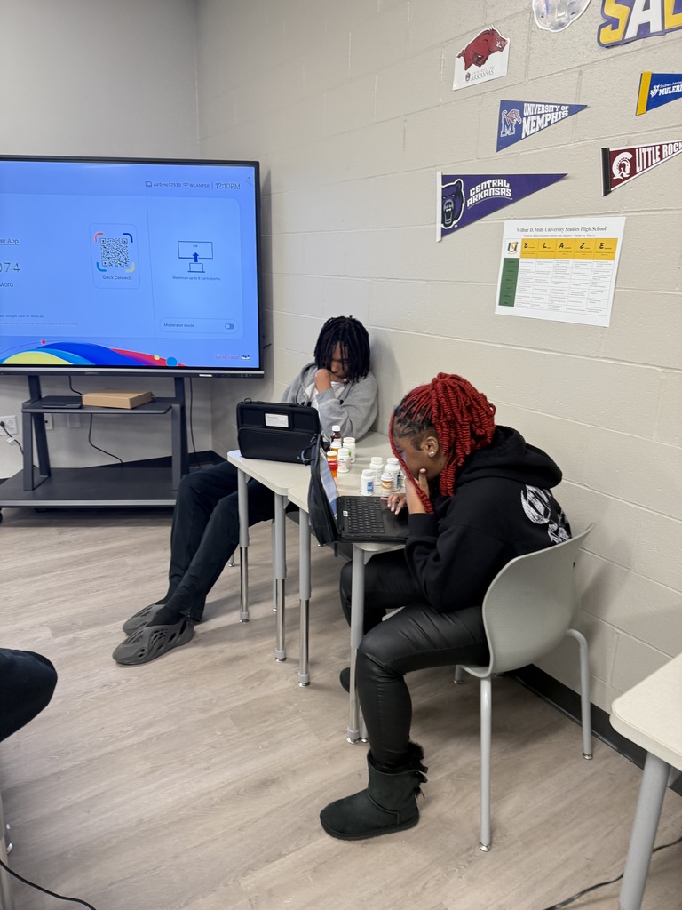 Two students working on health lesson