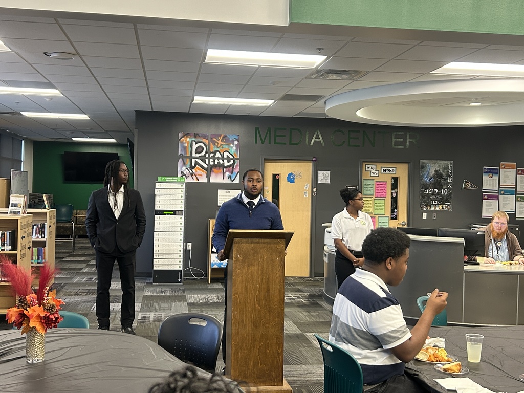 Guest speaker behind lectern