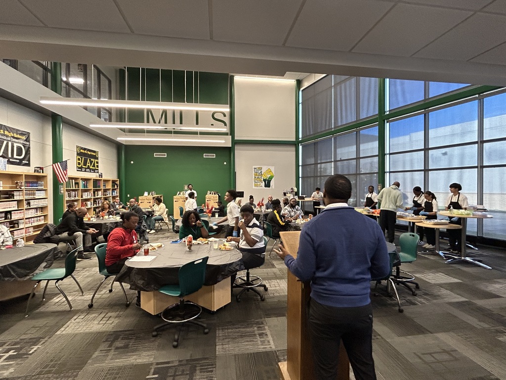 Guest speaker in school library