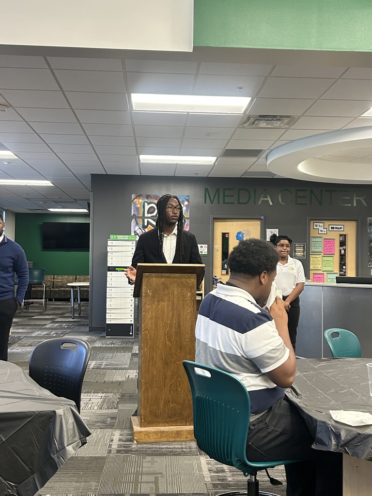 Student behind lectern