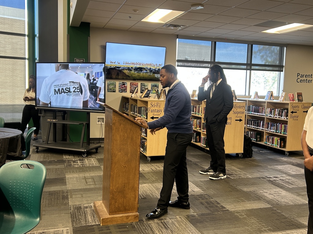 Guest speaker at lectern