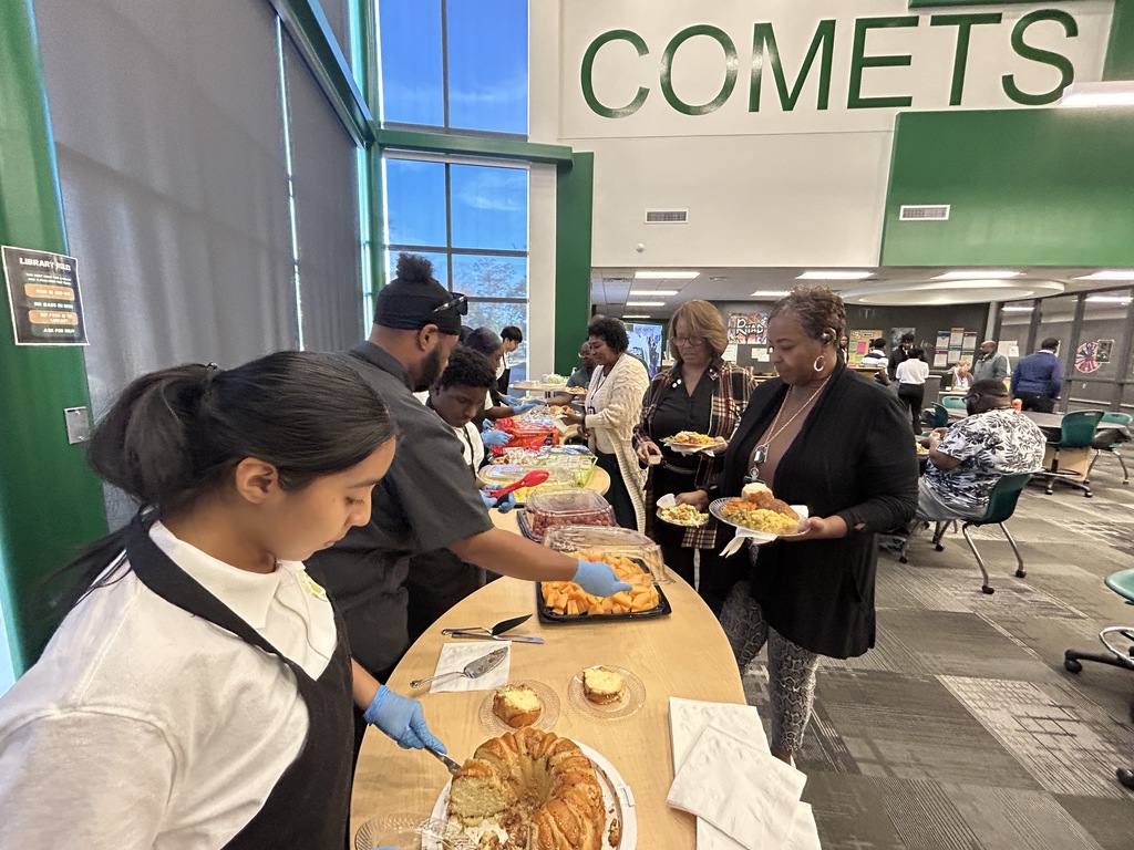 Students serving food