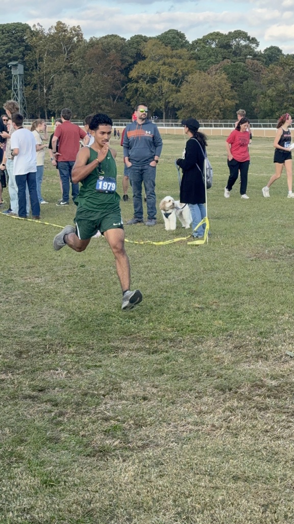 Student running at cross country meet