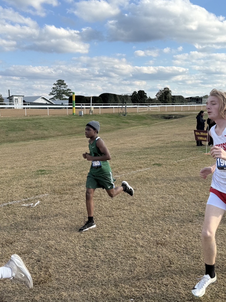 Student running in field