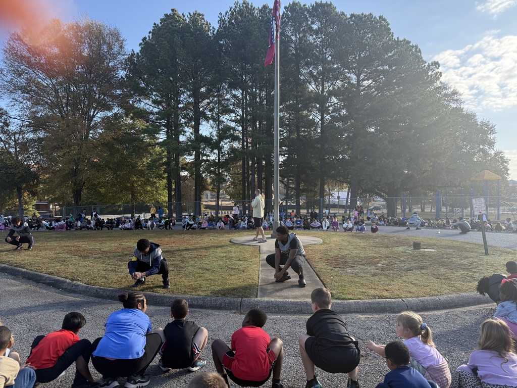 Football boys leading stretches