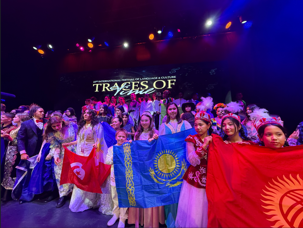 Namik Holding the Kazakhstan Flag