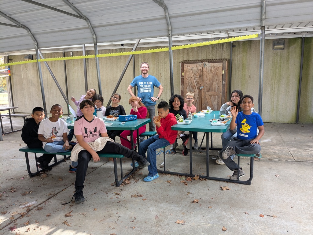 Two Languages Club at Cato Elementary posing for a picture.