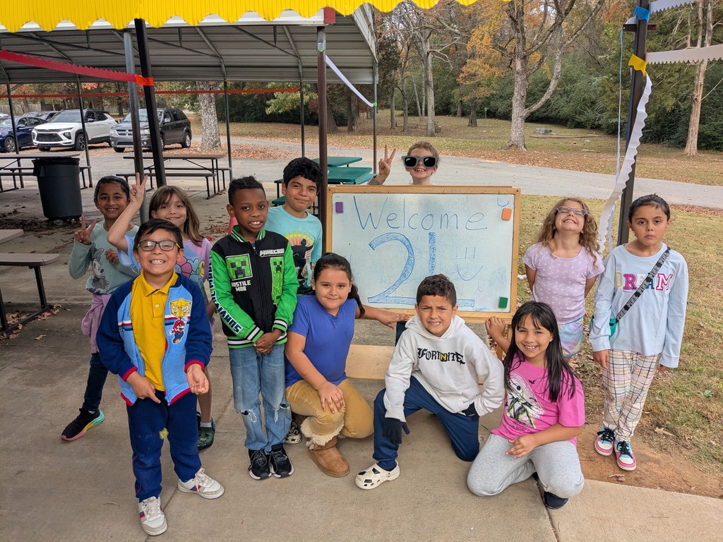 Two Languages Club at Cato Elementary posing for a picture.