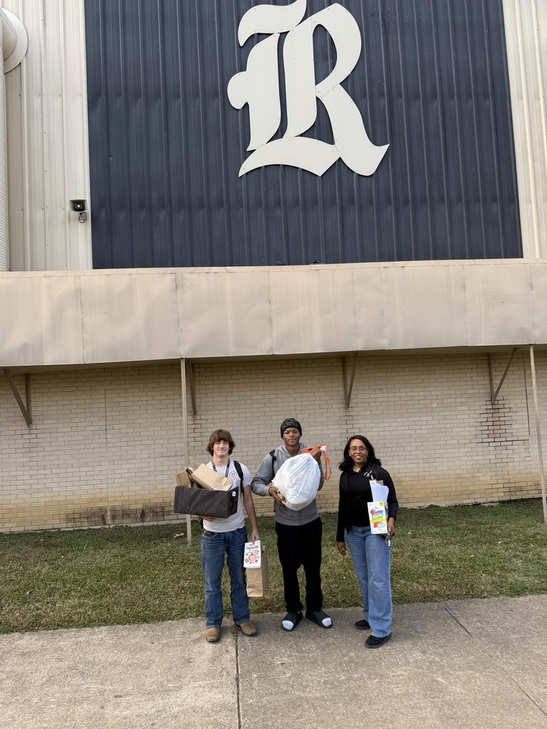 Spreading kindness! RHS JAG students putting heart into every bag and card. Pictured Left to Right Travin Forrest, Allen Davis,  Mrs. Gloria Whale 