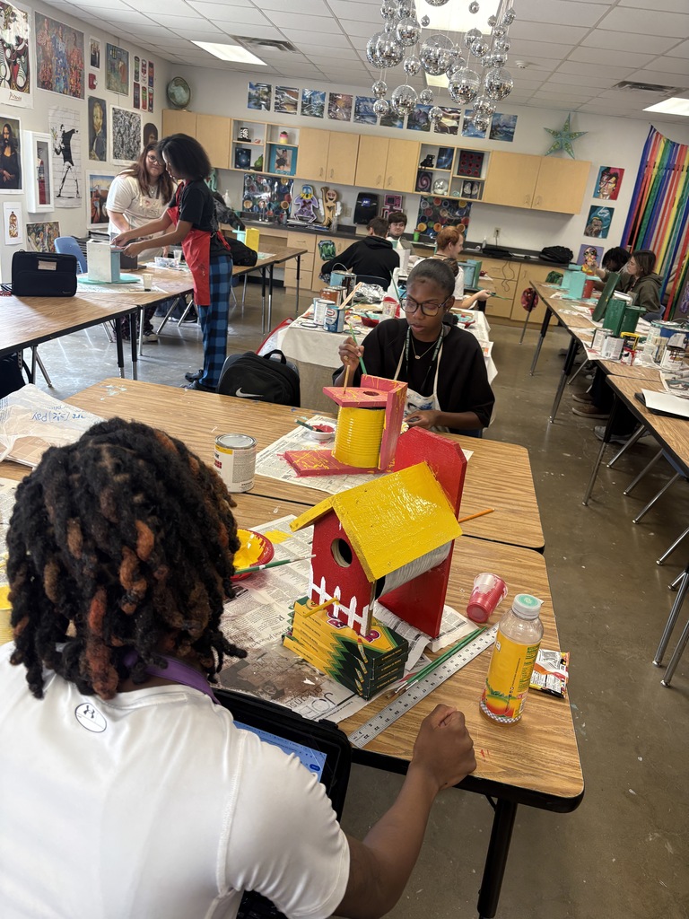SHHS Students painting birdhouses for the community. 