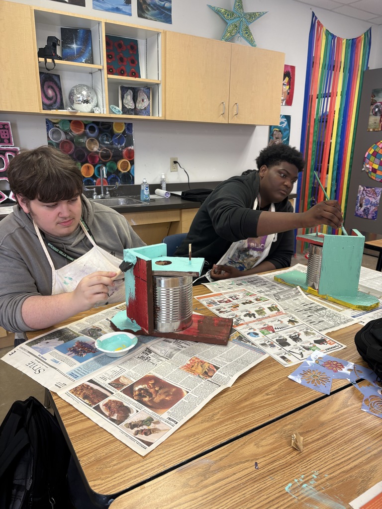 SHHS Students painting birdhouses for the community. 