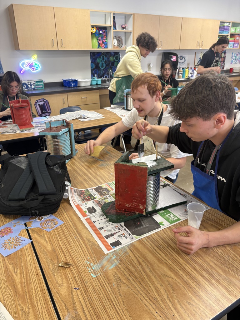 SHHS Students painting birdhouses for the community. 